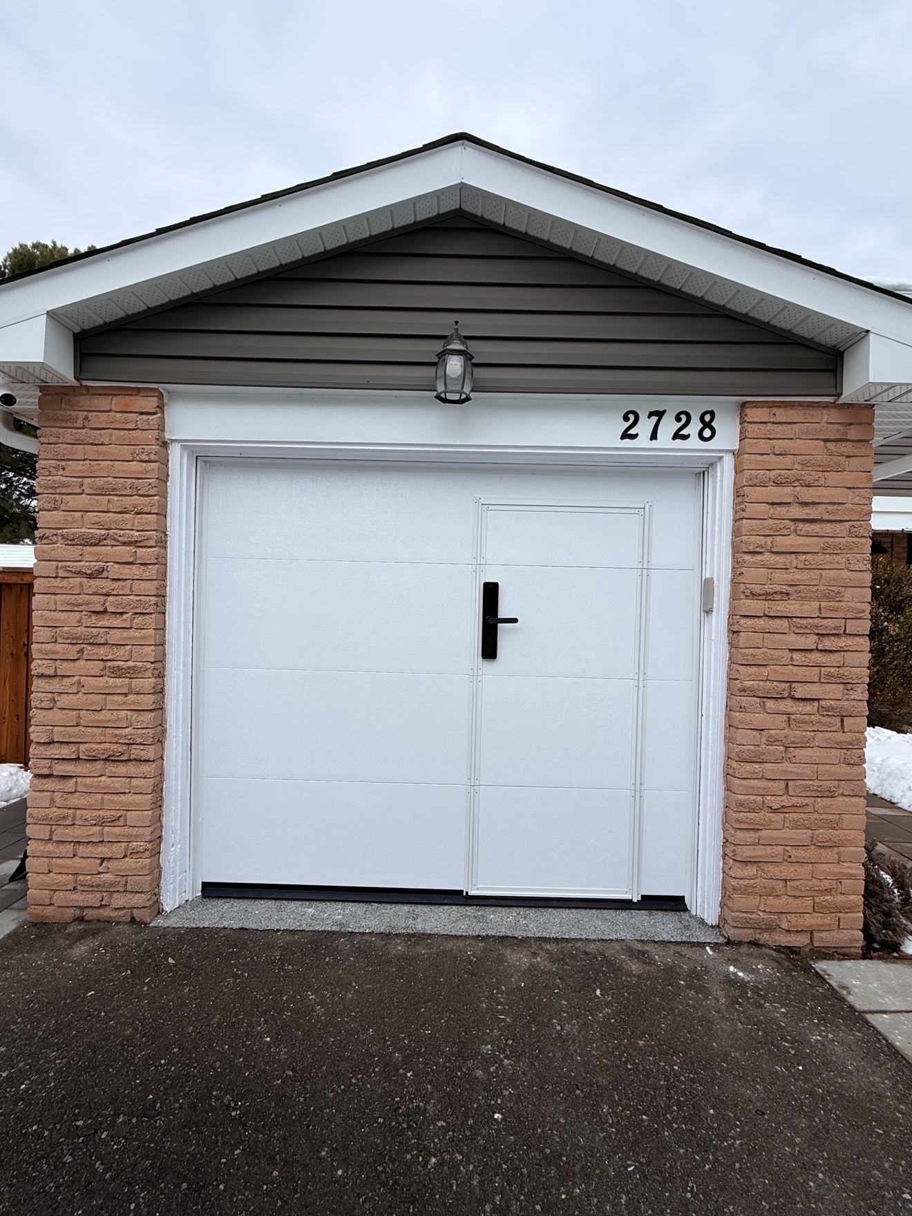 White single walk-through garage door